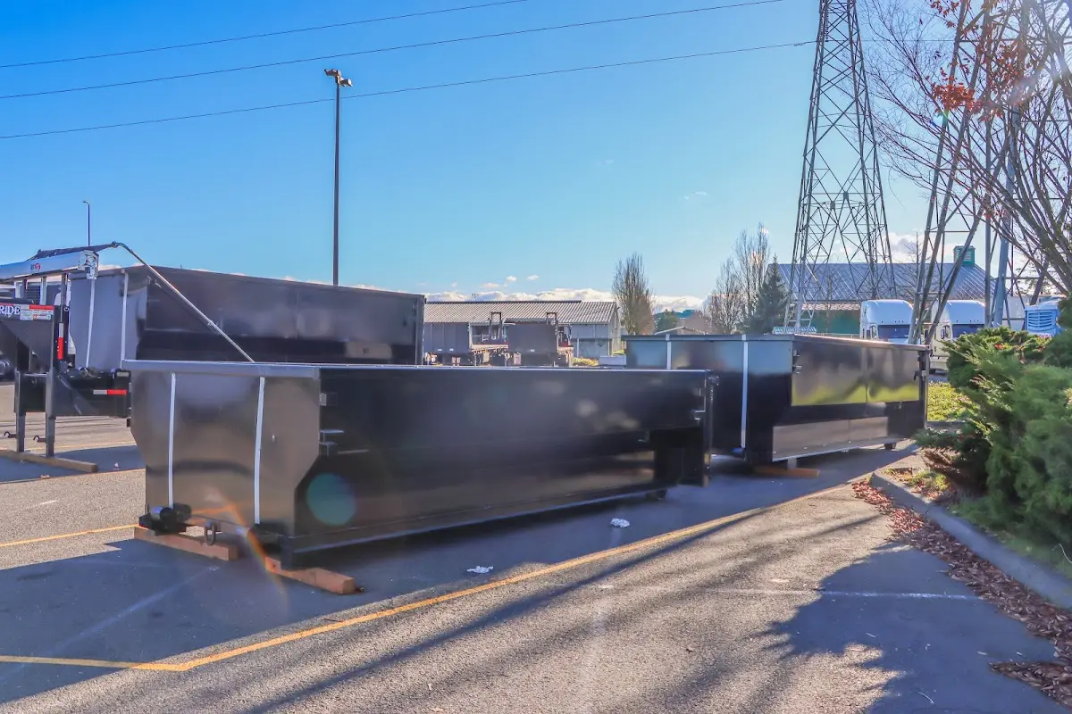 Roll-off dumpster ready for waste disposal at job site for Roofing Dumpster Rental in Scott